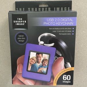 NIP The Sharper Image photo keychain